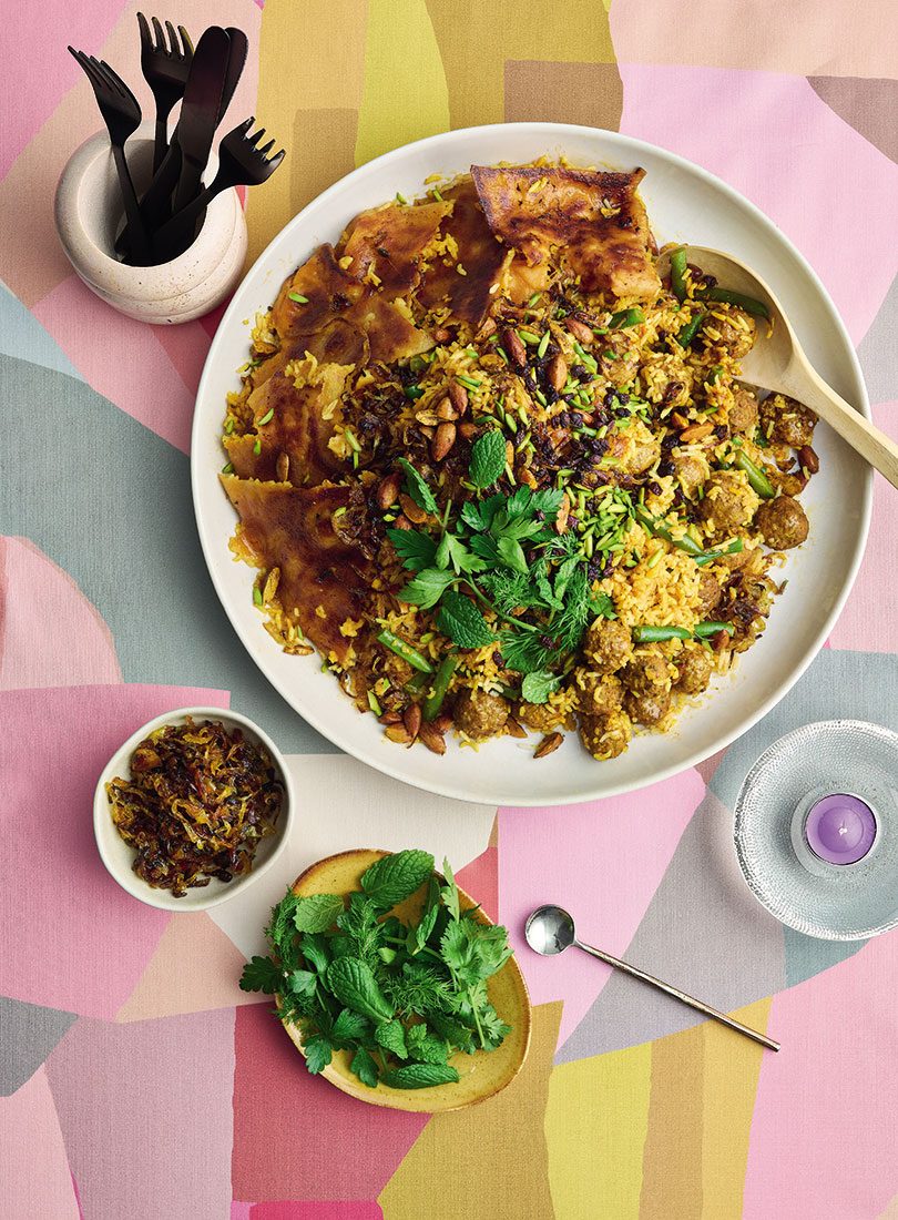 https://www.cuisine.co.nz/wp-content/uploads/2021/10/Cuisine-Magazine-Fiona-Smith-recipe-Spiced-Persian-Rice-with-Lamb-Beans-Flatbread-Tahdig-and-Almonds.jpg